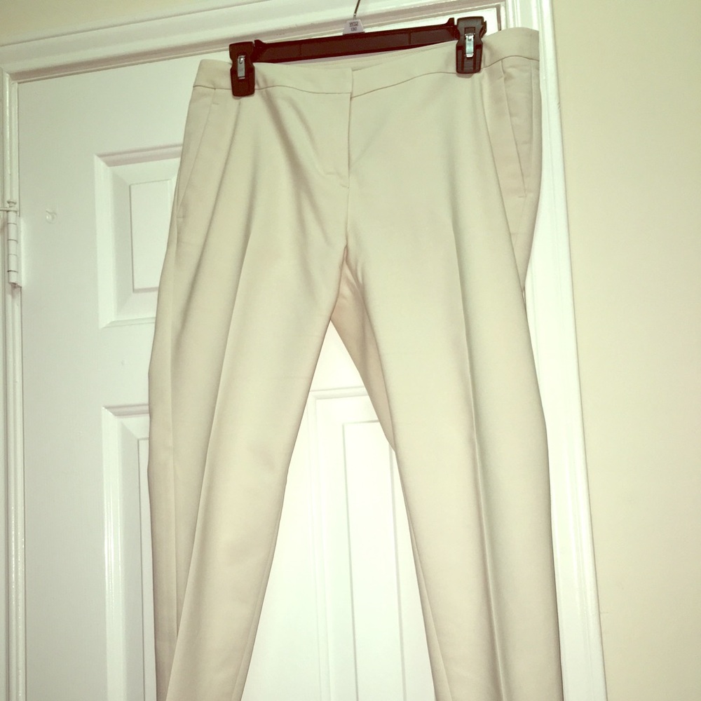 Cream trousers.